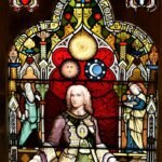 Detailed stained glass artwork featuring historical and religious elements in Lerwick, Scotland.